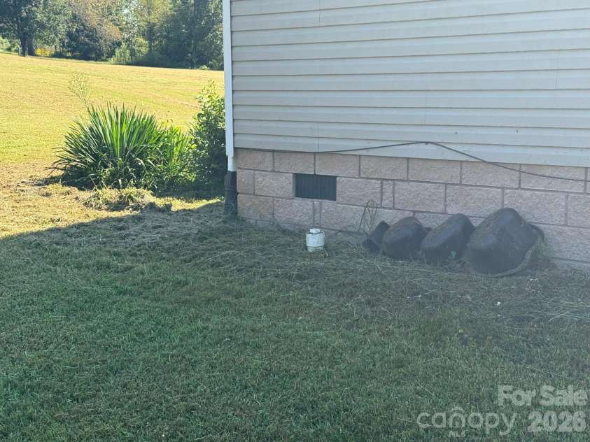 907 Epley Drive, Marion, NC 28752.  MLS# CAR4424716, YatesRealty ID 51528. Septic clean-out