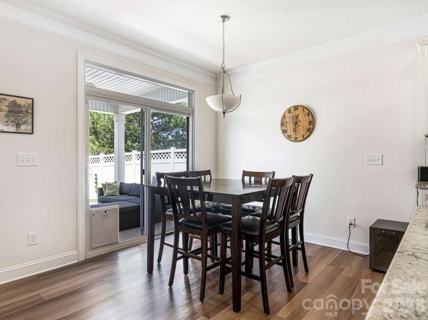 6008 Hampstead Pond Lane, Charlotte, NC 28105.  MLS# CAR4419795, YatesRealty ID 51529. Breakfast nook adjacent to kitchen and covered back patio