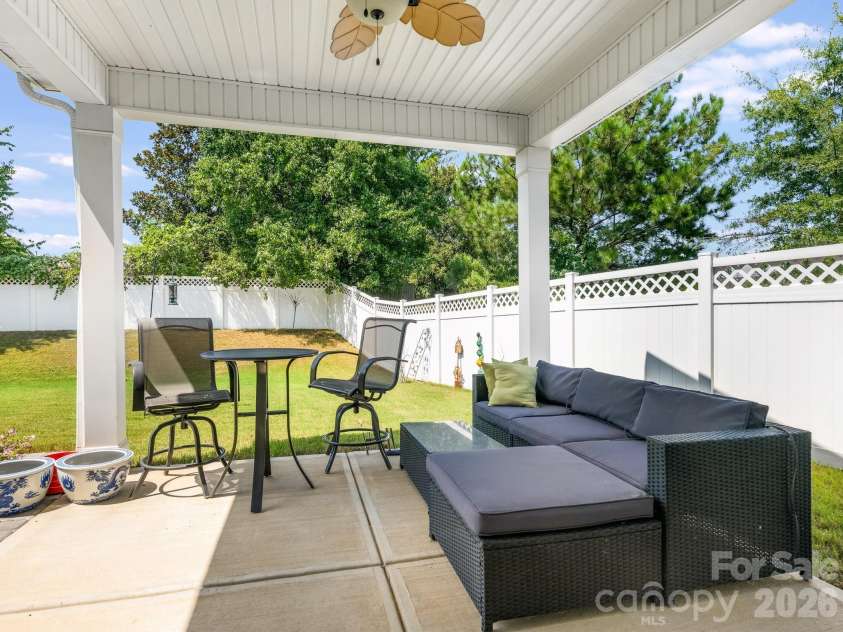 6008 Hampstead Pond Lane, Charlotte, NC 28105.  MLS# CAR4419795, YatesRealty ID 51529. Covered back patio area