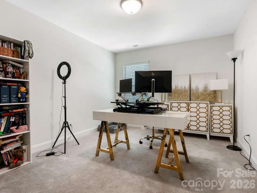 6008 Hampstead Pond Lane, Charlotte, NC 28105.  MLS# CAR4419795, YatesRealty ID 51529. Second level bedroom, currently used as office space