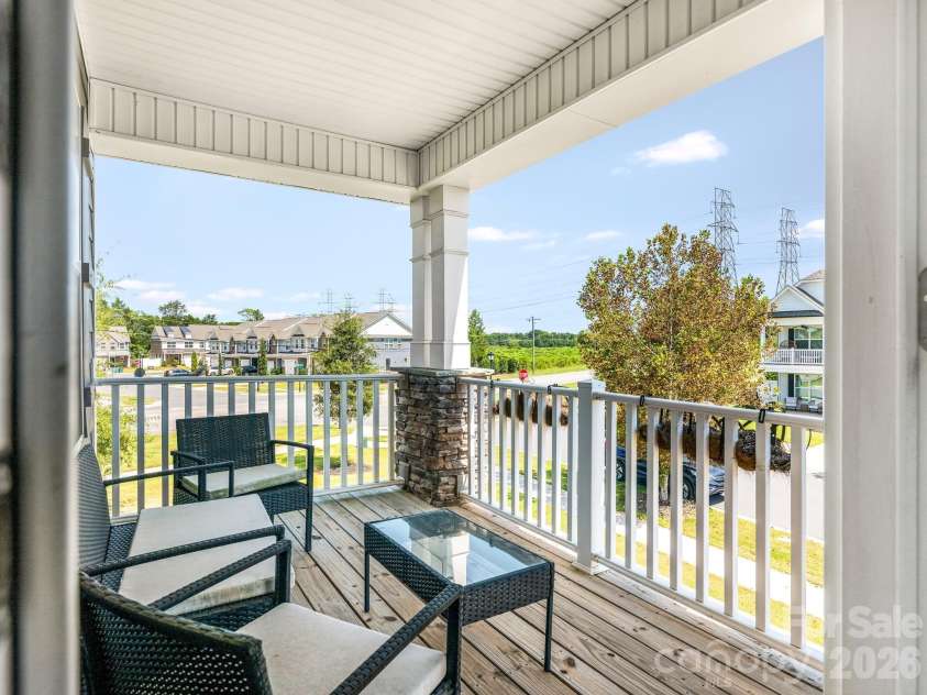 6008 Hampstead Pond Lane, Charlotte, NC 28105.  MLS# CAR4419795, YatesRealty ID 51529. Second level covered balcony porch