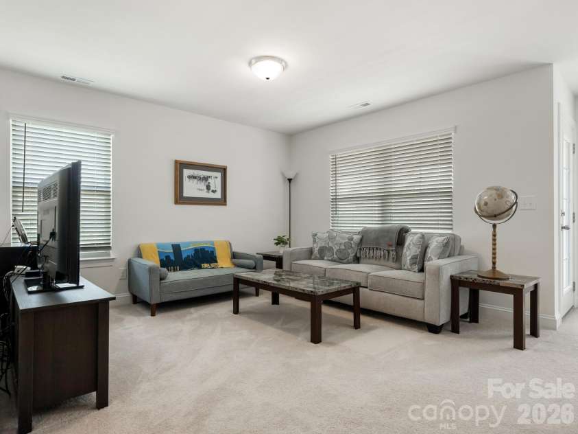 6008 Hampstead Pond Lane, Charlotte, NC 28105.  MLS# CAR4419795, YatesRealty ID 51529. Second level loft den