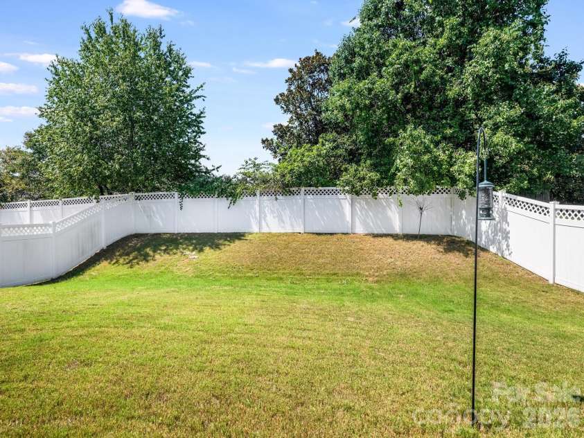 6008 Hampstead Pond Lane, Charlotte, NC 28105.  MLS# CAR4419795, YatesRealty ID 51529. Spacious and private fenced in back yard