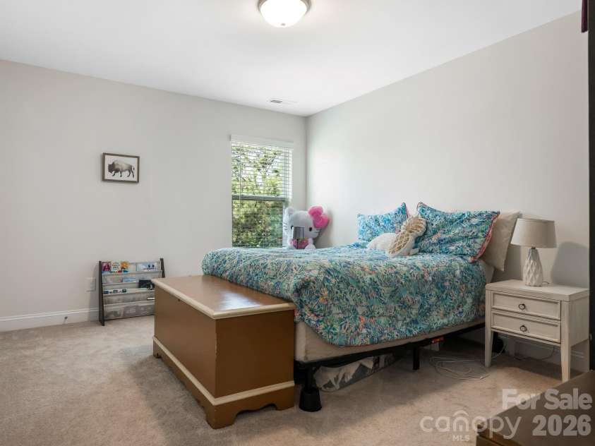 6008 Hampstead Pond Lane, Charlotte, NC 28105.  MLS# CAR4419795, YatesRealty ID 51529. Spacious second story secondary bedroom