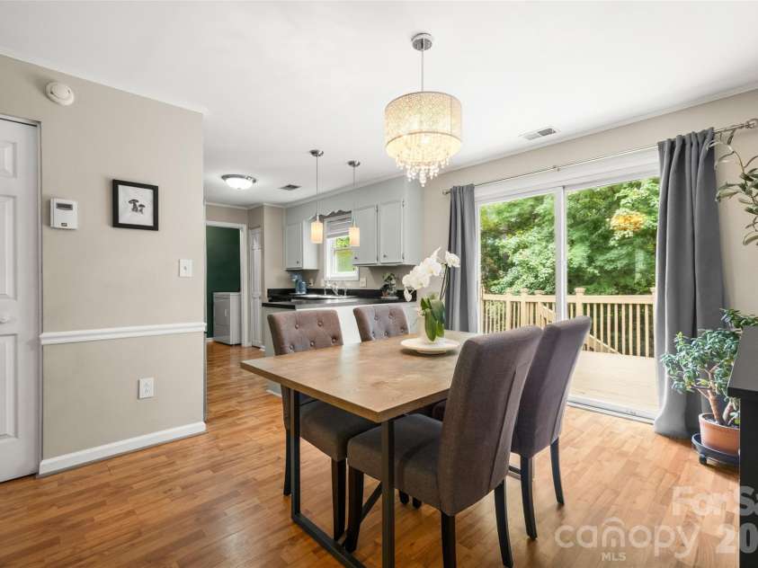 11218 Mallard Crossing Drive, Charlotte, NC 28262.  MLS# CAR4425577, YatesRealty ID 51530. Dining room facing Kitchen
