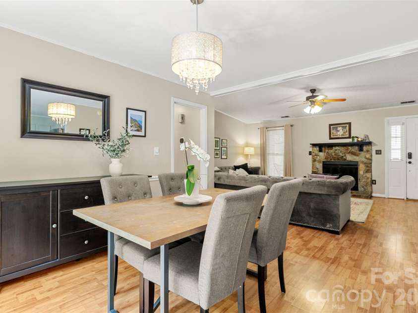 11218 Mallard Crossing Drive, Charlotte, NC 28262.  MLS# CAR4425577, YatesRealty ID 51530. Dining room facing LR