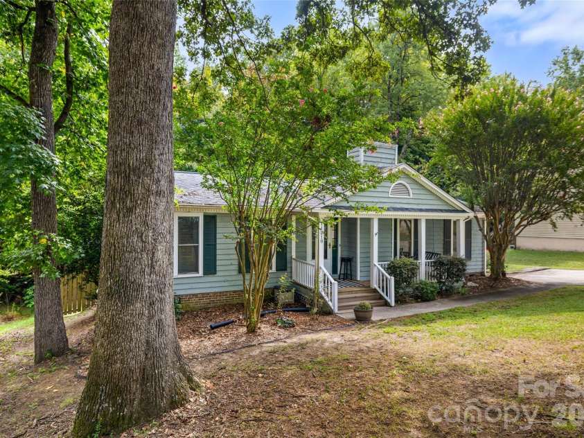 11218 Mallard Crossing Drive, Charlotte, NC 28262.  MLS# CAR4425577, YatesRealty ID 51530. Front view from left