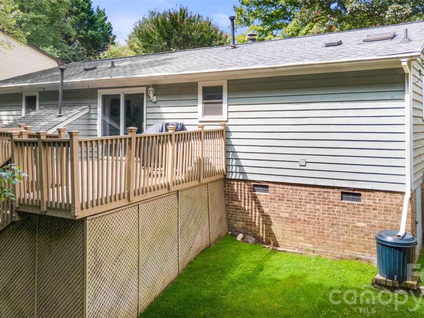 11218 Mallard Crossing Drive, Charlotte, NC 28262.  MLS# CAR4425577, YatesRealty ID 51530. Large newly painted deck