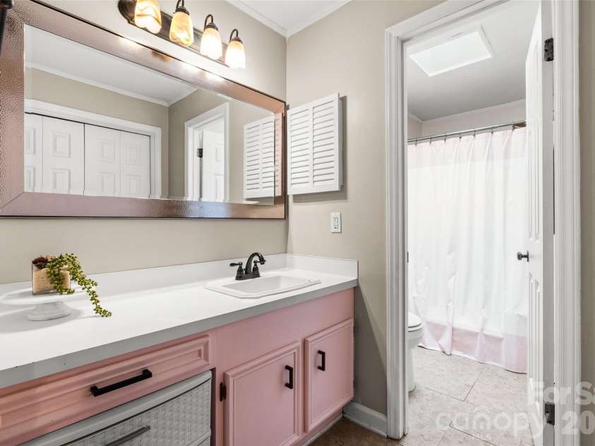 11218 Mallard Crossing Drive, Charlotte, NC 28262.  MLS# CAR4425577, YatesRealty ID 51530. Primary bathroom, shower & commode in has separate space