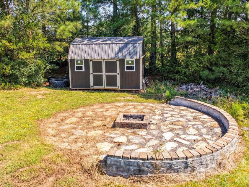 274 Boykin Place, Forest City, NC 28043.  MLS# CAR4425924, YatesRealty ID 51538. Firepit area