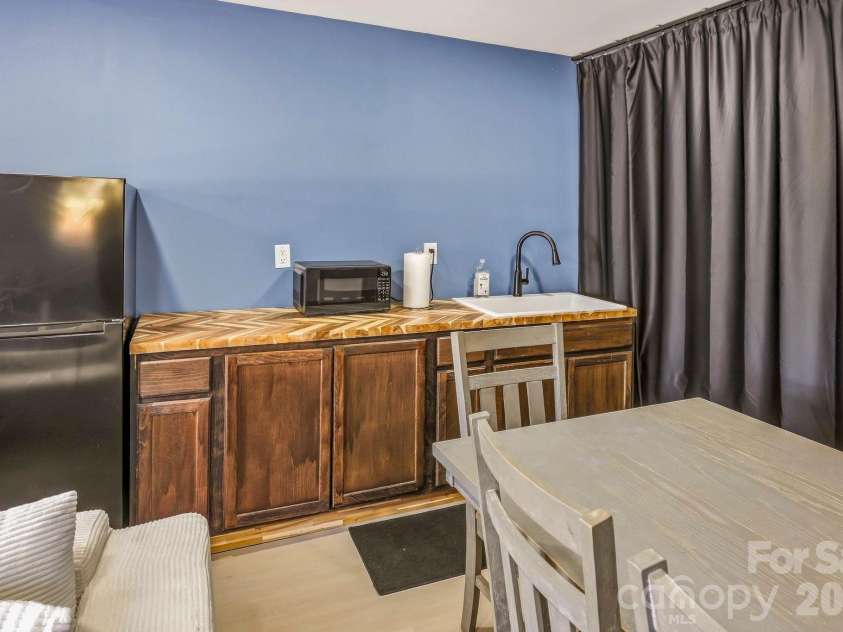 274 Boykin Place, Forest City, NC 28043.  MLS# CAR4425924, YatesRealty ID 51538. Quest quarters kitchenette