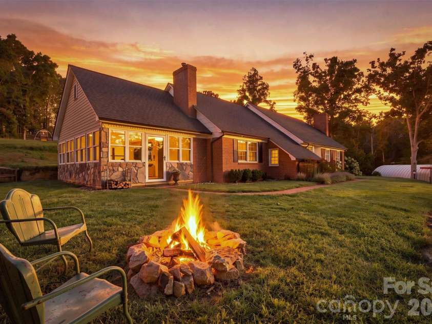 1732 Paul Payne Store Road, Taylorsville, NC 28681.  MLS# CAR4425907, YatesRealty ID 51541. Focused Front View/Fire Pit Virtually Enhanced