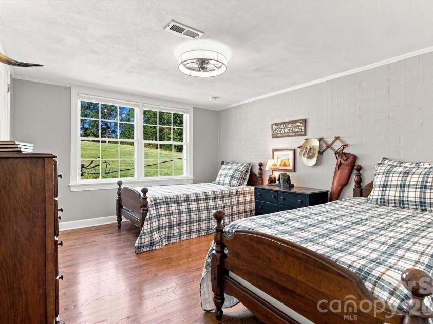 1732 Paul Payne Store Road, Taylorsville, NC 28681.  MLS# CAR4425907, YatesRealty ID 51541. Upper-Level Third Guestroom/Window View