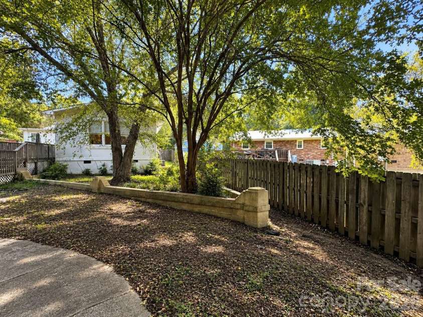 4711 Summit Avenue, Greensboro, NC 27405.  MLS# CAR4425186, YatesRealty ID 51545. Shaded Garden Retreat