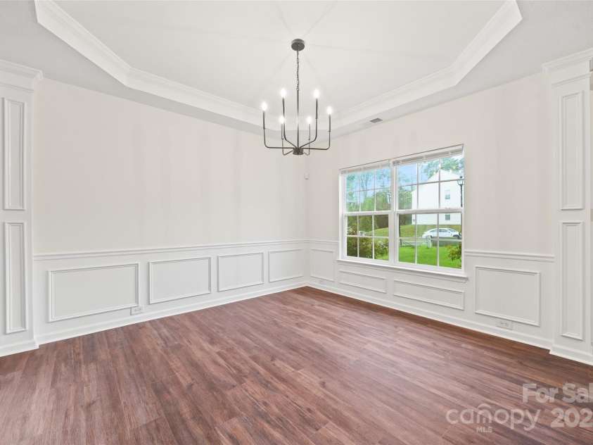 3725 Catawba Creek Drive, Gastonia, NC 28056.  MLS# CAR4240950, YatesRealty ID 5155. Classical details in the formal dining area.
