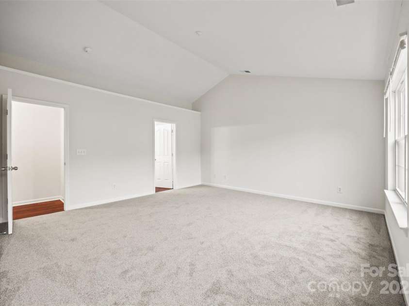 3725 Catawba Creek Drive, Gastonia, NC 28056.  MLS# CAR4240950, YatesRealty ID 5155. New carpeting in the primary suite.