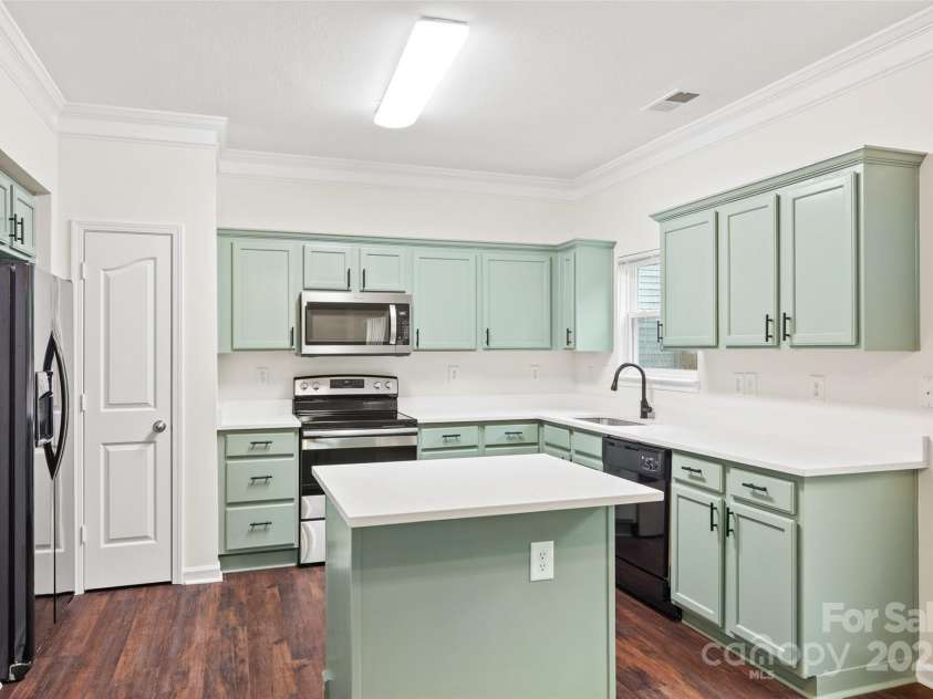 3725 Catawba Creek Drive, Gastonia, NC 28056.  MLS# CAR4240950, YatesRealty ID 5155. Please of cabinet and storage space.