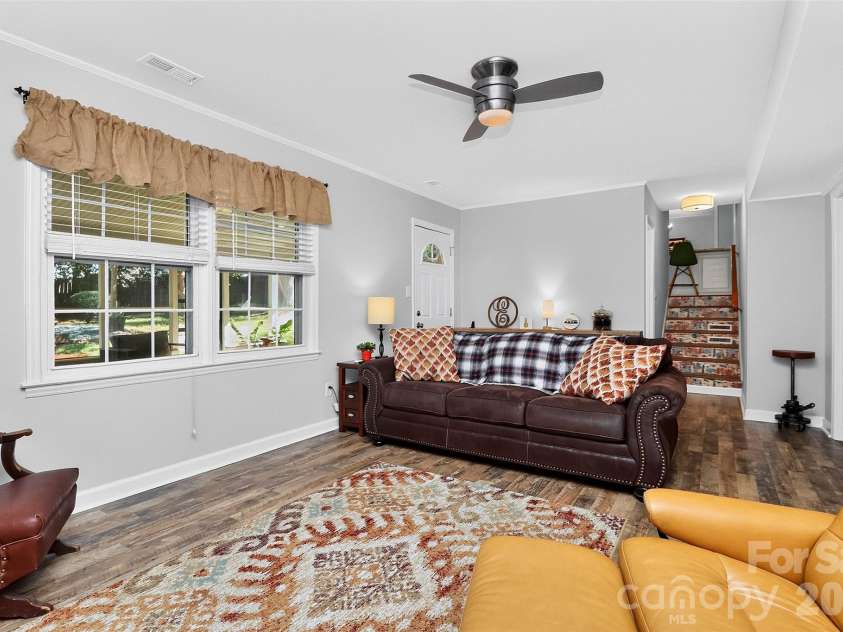 10743 Osprey Drive, Charlotte, NC 28226.  MLS# CAR4425593, YatesRealty ID 51555. Second living Room on lower level.