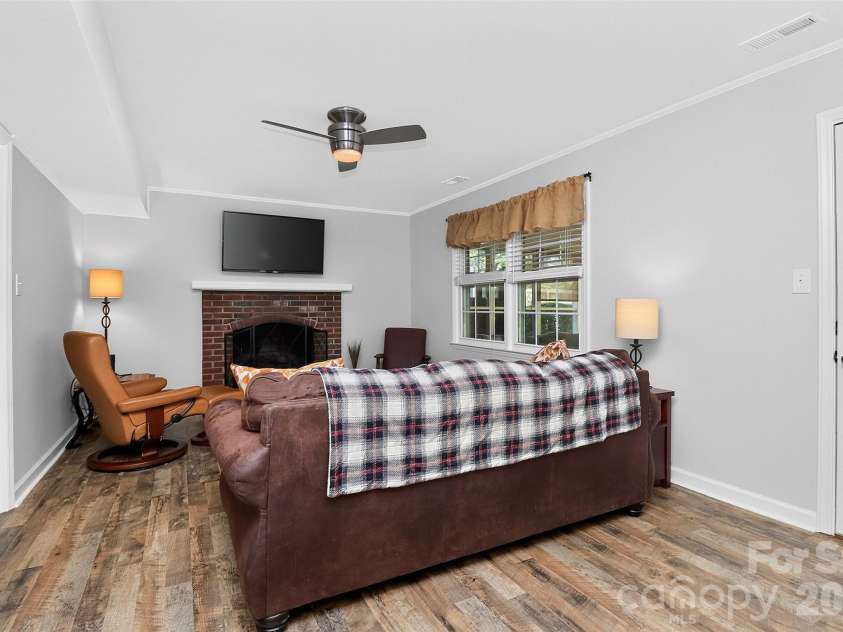 10743 Osprey Drive, Charlotte, NC 28226.  MLS# CAR4425593, YatesRealty ID 51555. Second living room on lower level.