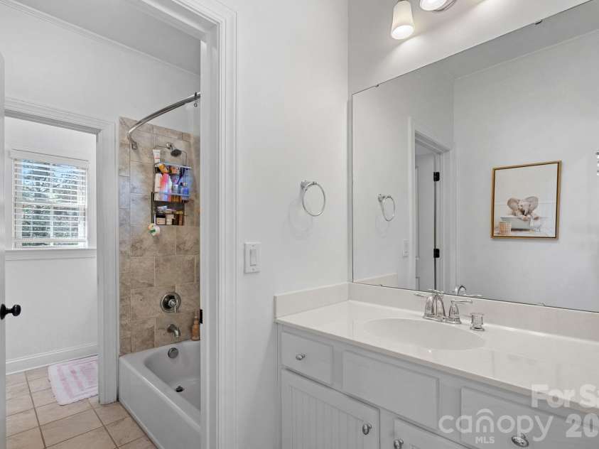 1104 Longwood Court, Matthews, NC 28104.  MLS# CAR4424764, YatesRealty ID 51561. Jack-n-Jill style bathroom