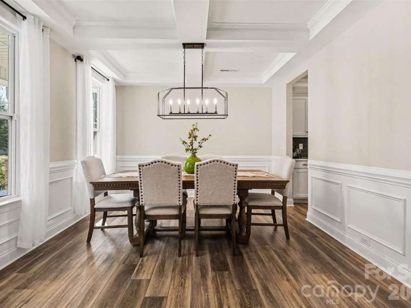 149 Longleaf Drive, Mooresville, NC 28117.  MLS# CAR4424546, YatesRealty ID 51571. Beautiful light fixture and big windows that filter in morning light.