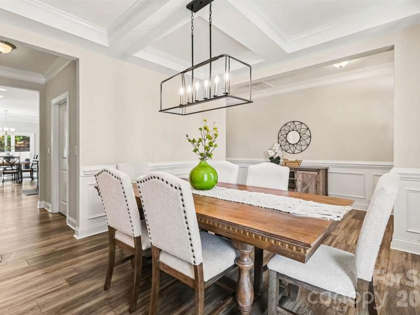 149 Longleaf Drive, Mooresville, NC 28117.  MLS# CAR4424546, YatesRealty ID 51571. Coffered ceiling, fresh neutral paint, chair rail moldings.