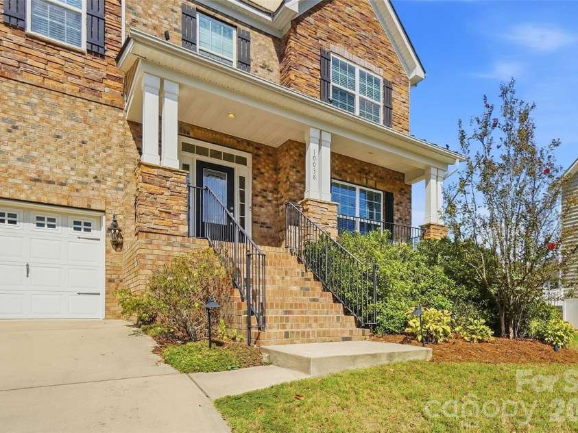 10038 Travertine Trail, Davidson, NC 28036.  MLS# CAR4424425, YatesRealty ID 51572. Front of Home