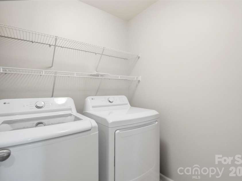 10038 Travertine Trail, Davidson, NC 28036.  MLS# CAR4424425, YatesRealty ID 51572. Laundry - 2nd Level