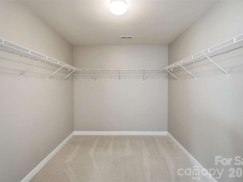 10038 Travertine Trail, Davidson, NC 28036.  MLS# CAR4424425, YatesRealty ID 51572. Primary Suite - Large Closet