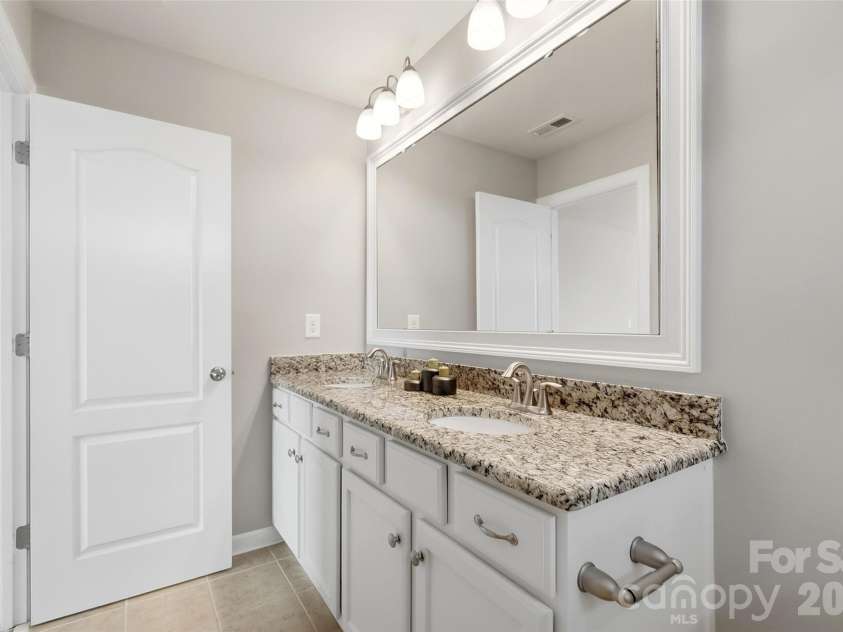 10038 Travertine Trail, Davidson, NC 28036.  MLS# CAR4424425, YatesRealty ID 51572. Second Primary - Bathroom
