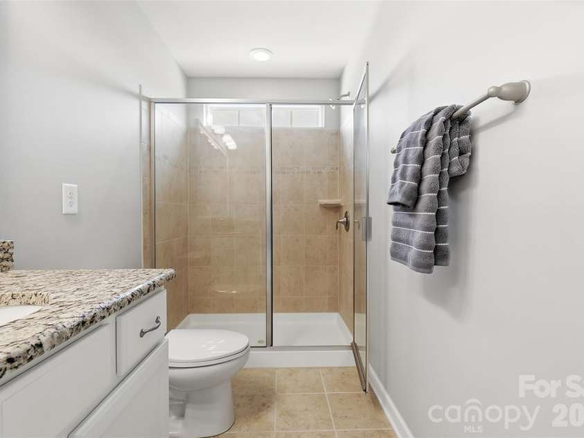 10038 Travertine Trail, Davidson, NC 28036.  MLS# CAR4424425, YatesRealty ID 51572. Second Primary - Bathroom