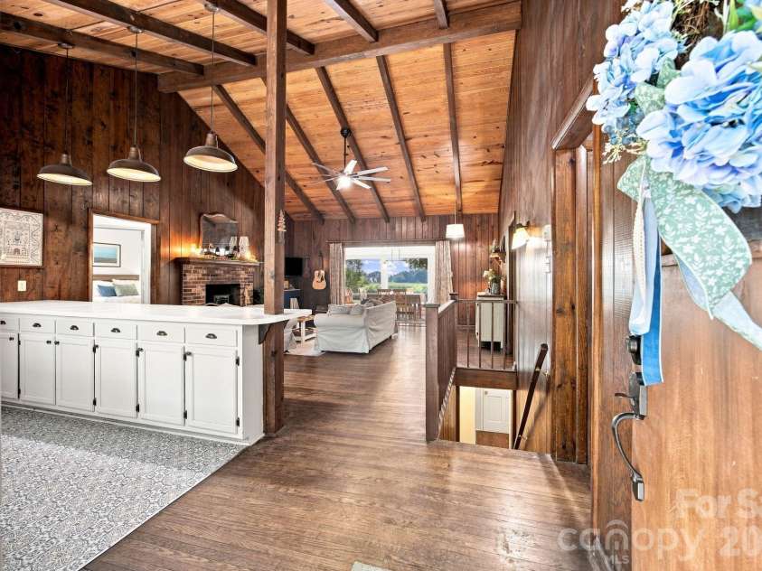 4036 Rhynland Drive, Sherrills Ford, NC 28673.  MLS# CAR4425140, YatesRealty ID 51577. Step inside to warm wood tones and an open flow