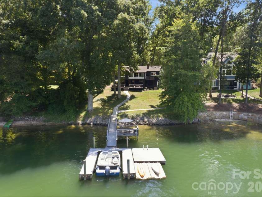 4036 Rhynland Drive, Sherrills Ford, NC 28673.  MLS# CAR4425140, YatesRealty ID 51577. Your private dock is just steps from the back door.