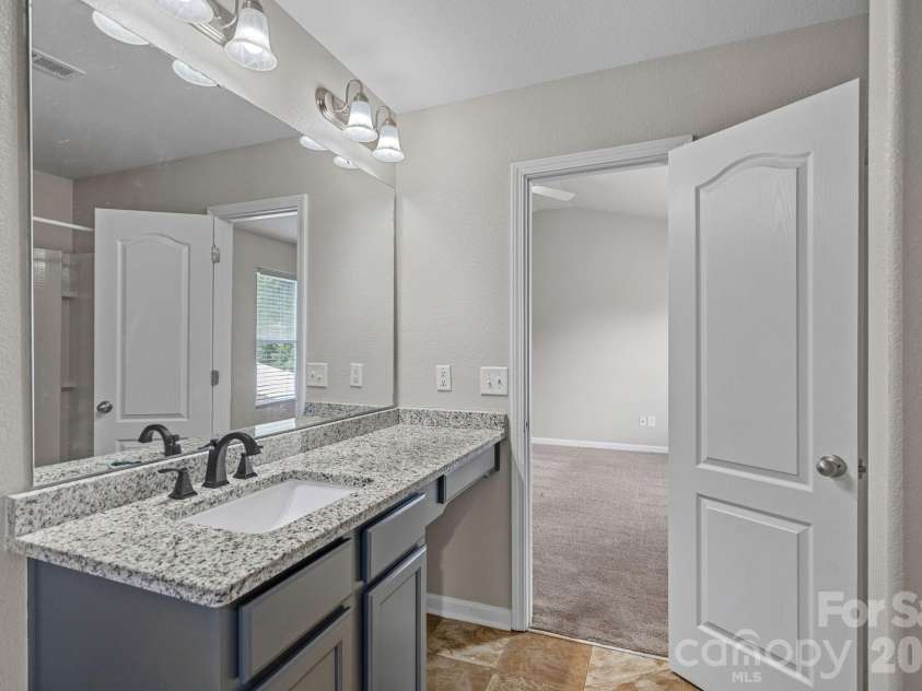 8226 Paw Valley Lane, Charlotte, NC 28214.  MLS# CAR4424539, YatesRealty ID 51583. Primary Bathroom