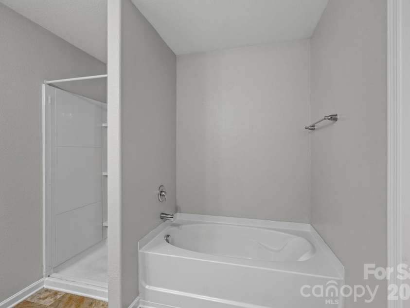 8226 Paw Valley Lane, Charlotte, NC 28214.  MLS# CAR4424539, YatesRealty ID 51583. Primary bathroom