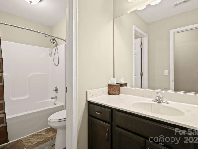412 Greenview Drive, Jefferson, NC 28640.  MLS# CAR4216425, YatesRealty ID 5159. Guest bathroom