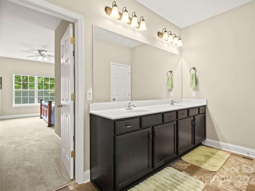 412 Greenview Drive, Jefferson, NC 28640.  MLS# CAR4216425, YatesRealty ID 5159. Master Bath on main floor