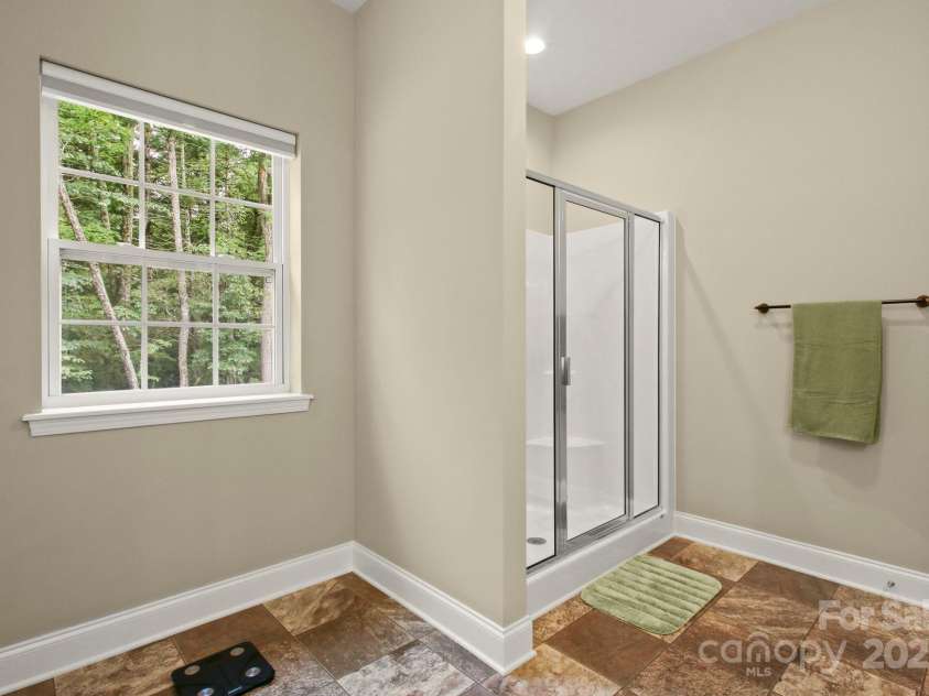 412 Greenview Drive, Jefferson, NC 28640.  MLS# CAR4216425, YatesRealty ID 5159. Master walk-in shower