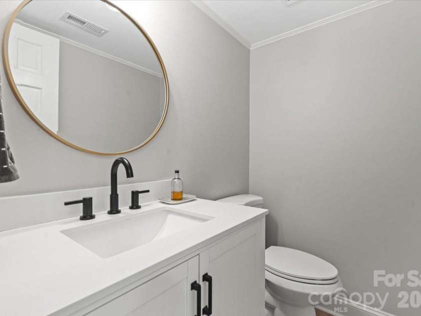 642 Furrow Drive, Charlotte, NC 28270.  MLS# CAR4424607, YatesRealty ID 51591. Updated half bath on main level