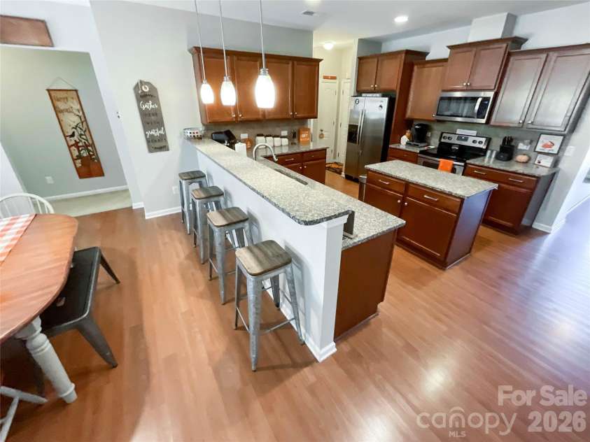 1401 Yellow Daisy Drive, Matthews, NC 28104.  MLS# CAR4424626, YatesRealty ID 51594. 