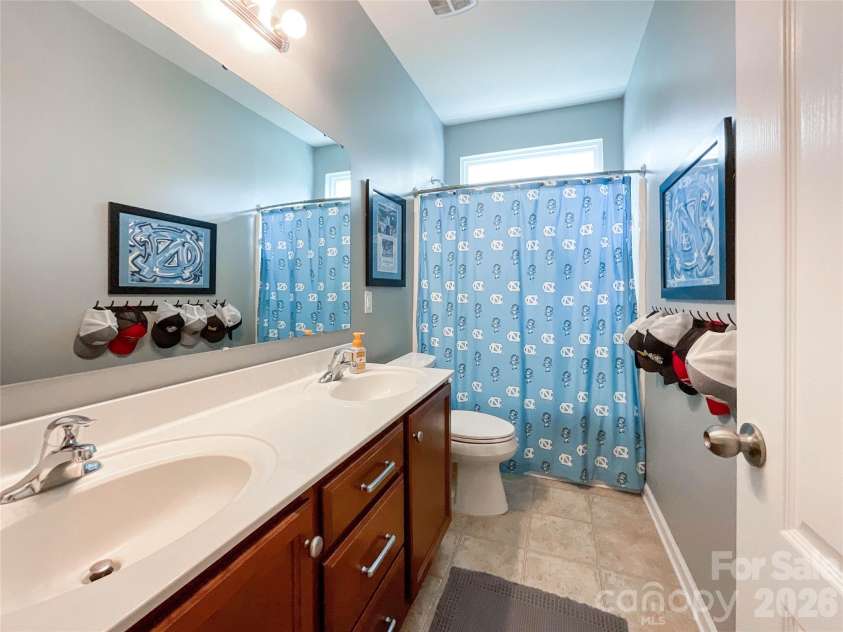 1401 Yellow Daisy Drive, Matthews, NC 28104.  MLS# CAR4424626, YatesRealty ID 51594. 