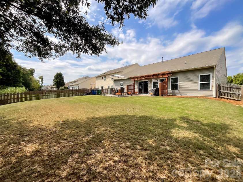 1401 Yellow Daisy Drive, Matthews, NC 28104.  MLS# CAR4424626, YatesRealty ID 51594. 