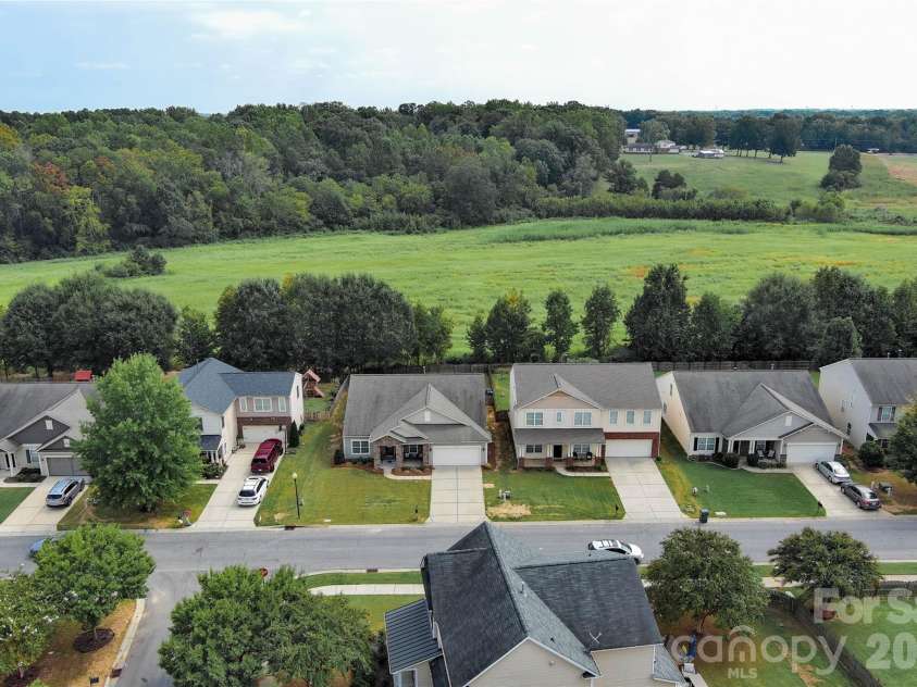 1401 Yellow Daisy Drive, Matthews, NC 28104.  MLS# CAR4424626, YatesRealty ID 51594. 