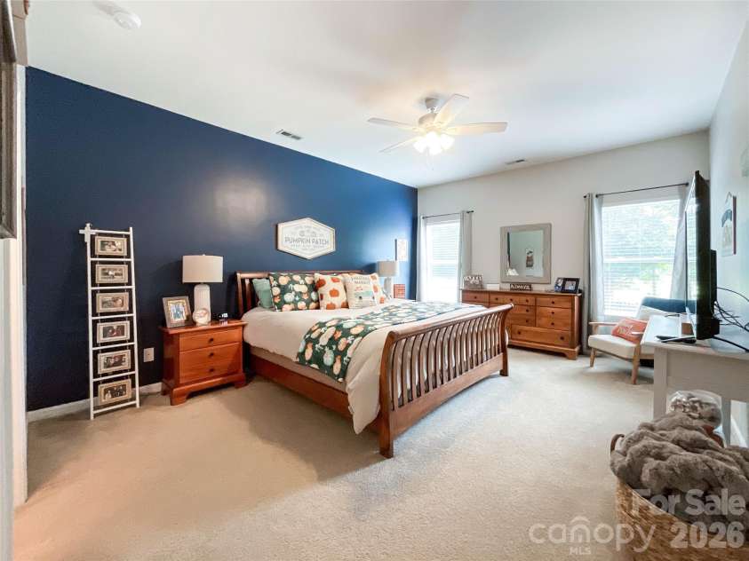 1401 Yellow Daisy Drive, Matthews, NC 28104.  MLS# CAR4424626, YatesRealty ID 51594. Primary Bedroom