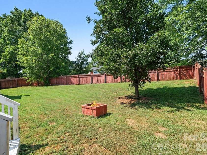983 Farmington Court, Concord, NC 28025.  MLS# CAR4423644, YatesRealty ID 51599. Backyard