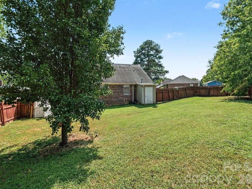 983 Farmington Court, Concord, NC 28025.  MLS# CAR4423644, YatesRealty ID 51599. Backyard