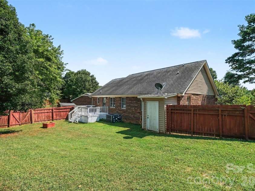 983 Farmington Court, Concord, NC 28025.  MLS# CAR4423644, YatesRealty ID 51599. Backyard