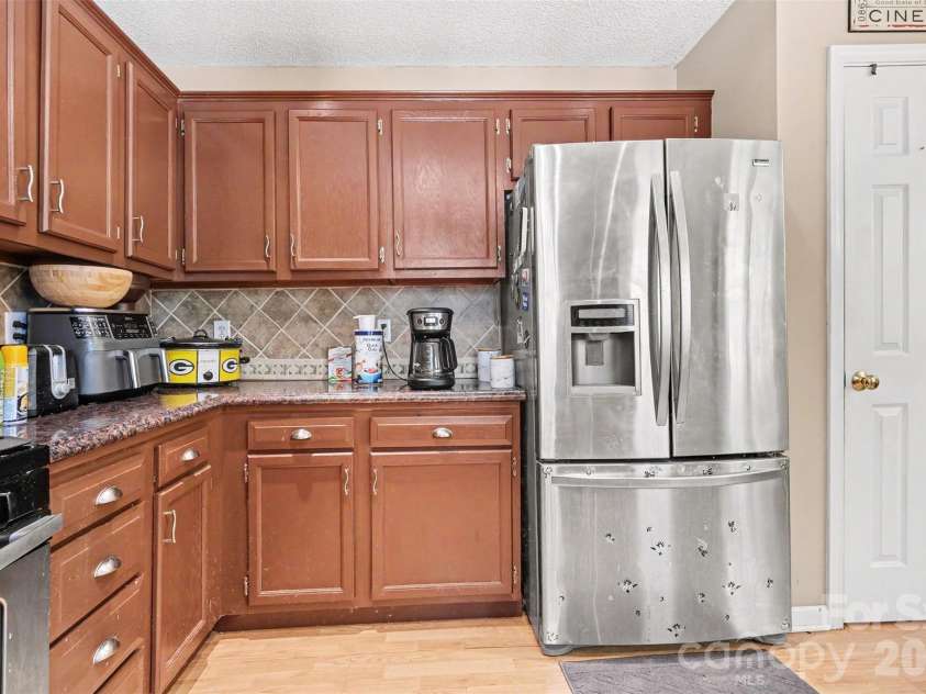 983 Farmington Court, Concord, NC 28025.  MLS# CAR4423644, YatesRealty ID 51599. Kitchen with Pantry