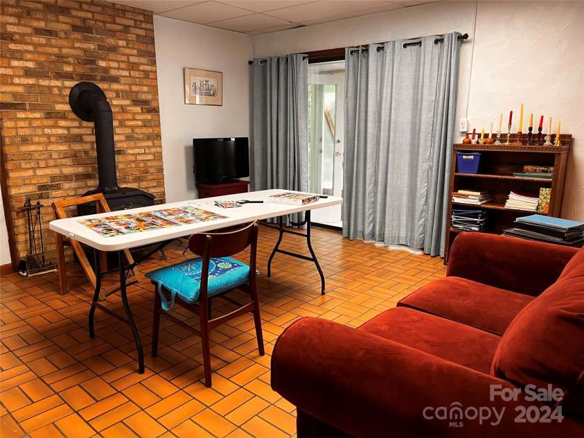 585 Nottingham Road, Brevard, NC 28712.  MLS# CAR4207707, YatesRealty ID 516. Family room
