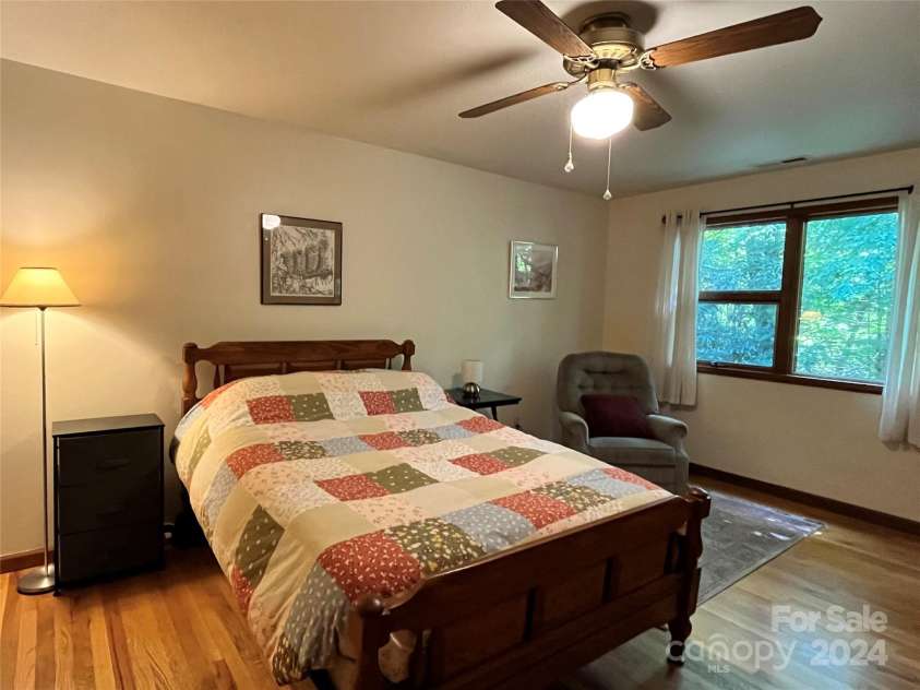 585 Nottingham Road, Brevard, NC 28712.  MLS# CAR4207707, YatesRealty ID 516. Primary bedroom